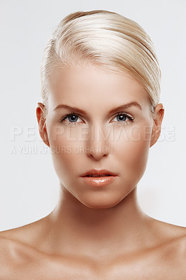 Buy stock photo Portrait, studio and serious woman with makeup for skincare, cosmetics and beauty on white background. Confident, dermatology and female person for self care with aesthetic, skin treatment and glow