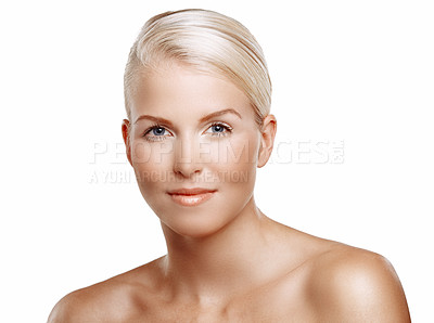 Buy stock photo Beauty shot of a young blonde woman looking at the camera