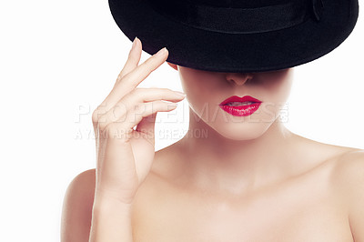 Buy stock photo Beauty shot of a young woman wearing a hat and red lipstick