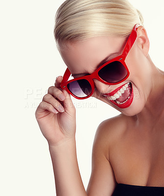 Buy stock photo Woman, laughing and sunglasses for trendy in studio with makeup, lipstick and mockup space. Happy, model girl and eyewear for cosmetics, fashion and aesthetics by white background for retro or style 