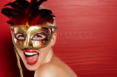 Buy stock photo Portrait, excited and woman in carnival mask for fun, art deco and dress up by red background. Happiness, female person and mysterious or playful with wow emoji for mockup in studio with lipstick