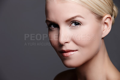 Buy stock photo Studio portrait of a beautiful woman isolated on gray with copyspace