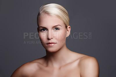 Buy stock photo Studio portrait of a beautiful woman isolated on gray