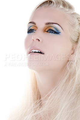 Buy stock photo Woman, rainbow eyeshadow with creative beauty and unique cosmetics for cosmetology in studio. Model face, female person and bold color for festival makeup and glitter sparkle by white background