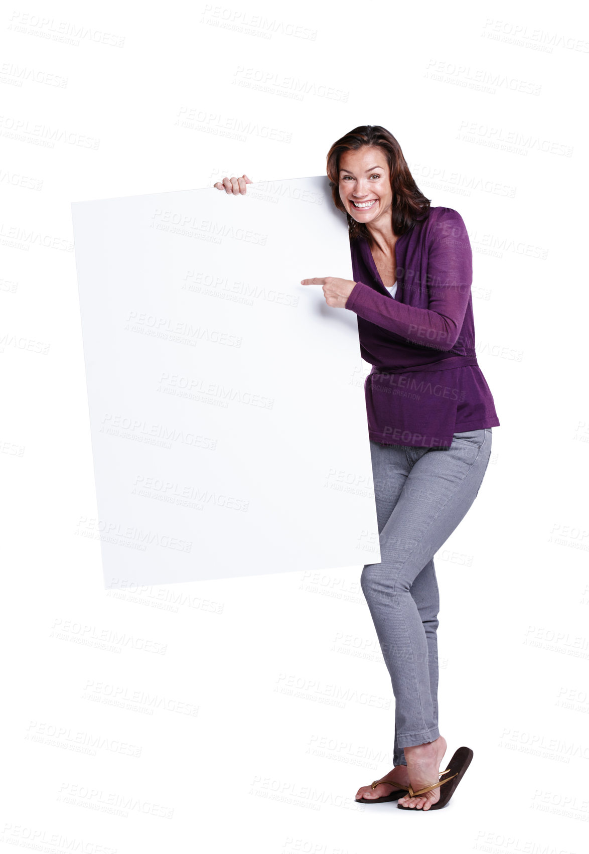 Buy stock photo Portrait, billboard and woman pointing in studio with excitement for promotion, information and mockup space. Blank poster, female person and happy for advertising, presentation and white background 