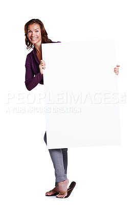 Buy stock photo Billboard, portrait and happy woman in studio for promotion, branding and mockup space. Blank poster, female person and smile or pride for review, choice and presentation or news by white background 