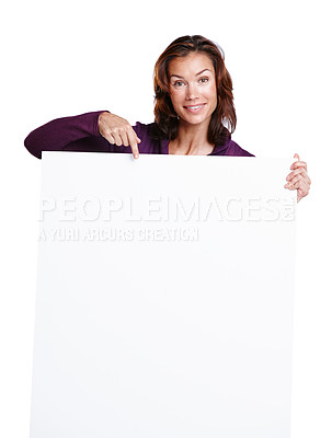 Buy stock photo Portrait, pointing and billboard with woman in studio for promotion, branding and mockup space. Blank poster, female person and presentation for choice, sale and news by white background with smile