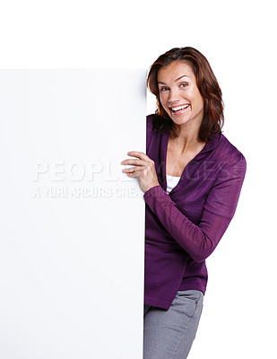 Buy stock photo Mockup, smile and portrait of woman with poster in studio with space for advertising, marketing or promotion. Billboard, happy and female person with blank paper for sign isolated by white background