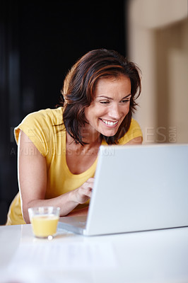 Buy stock photo Woman, typing and laptop in home for remote work, writing email and planning schedule for freelance. Female person, computer and internet research for copywriting career, editing article and smile