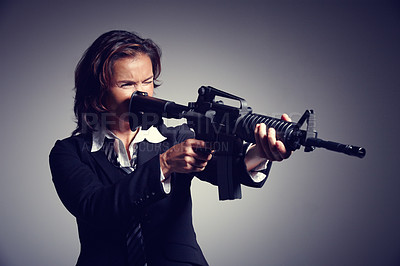 Buy stock photo Gun, weapon and business woman in studio for protection in corporate company, career and job. Professional, boss and isolated person with rifle to fight crime, corruption and mafia on gray background