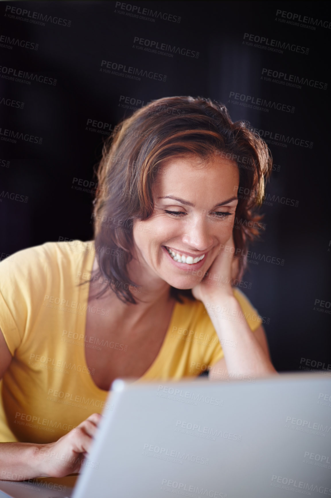 Buy stock photo Happy, laugh and woman with laptop in house for streaming, video or funny movie, show or reel on black background. Social media, comic and person watching online comedy, program or reading gossip