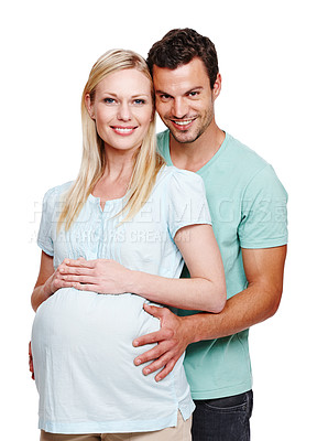 Buy stock photo Portrait, couple and pregnant hug in studio white background together for memories, romance and support. Smiling, man and woman embrace with care for maternity and commitment to relationship