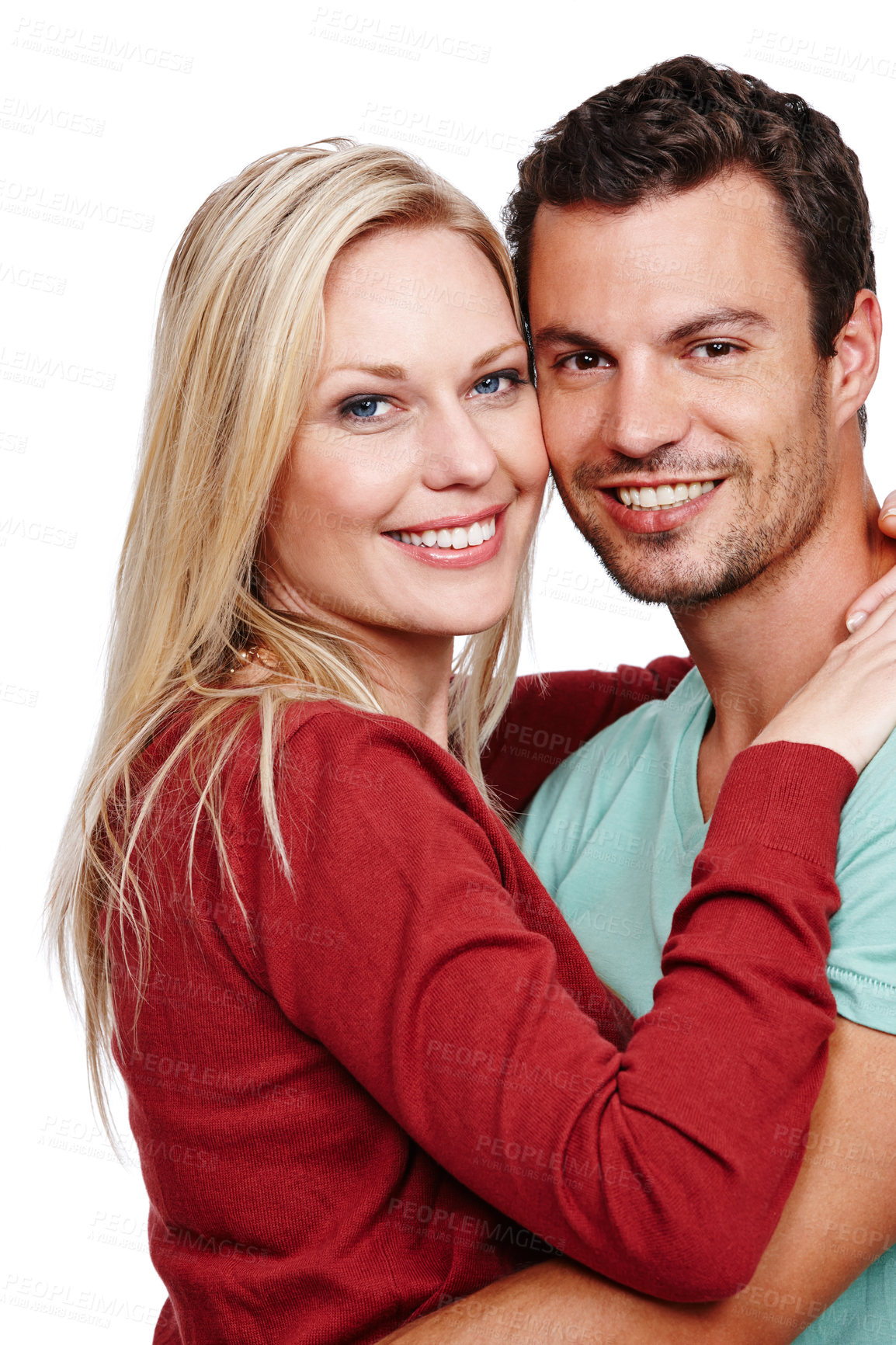 Buy stock photo An attractive couple smiling at the camera against a white background