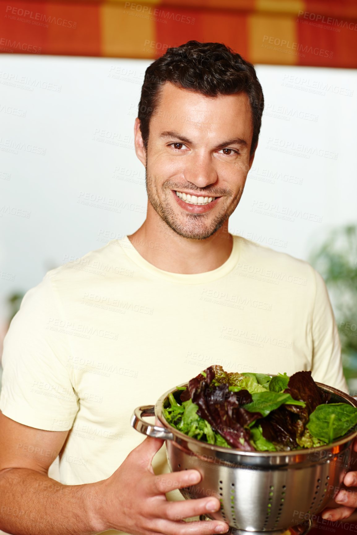 Buy stock photo Man, portrait and home or smile with lettuce, salad preparation and vegetable in colander bowl. Happy, organic and health nutrition or outside, vegetarian and natural vitamin a and super food