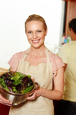 Buy stock photo Portrait, smile and woman with salad bowl in kitchen, happiness and nutrition with side dish. Face, home and wife with husband, lettuce and cheerful with wellness, diet and healthy ingredients or joy