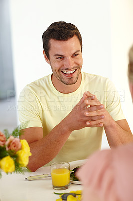 Buy stock photo A handsome man enjoying a healthy lunch with his wife