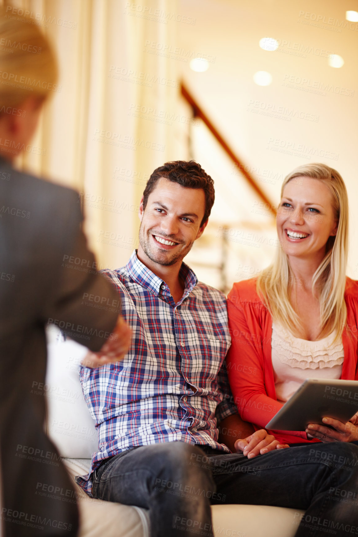 Buy stock photo Realtor, couple and handshake in home meeting, success or consultation for selling or buying property. Happy people shaking hands with real estate agent for discussion of price and house market value