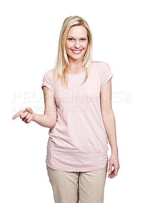 Buy stock photo Happy portrait, woman and pointing with mockup for promotion, deal or information in studio. Smile, female person and gesture to space for announcement, logo and advertising by white background