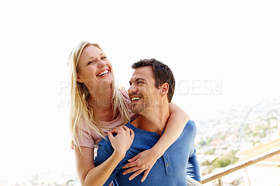 Buy stock photo A playful young couple having fun together