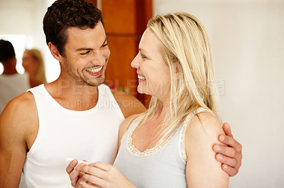 Buy stock photo Love, support and pregnancy test for excited couple in house with fertility celebration, news or bonding over positive results. Ivf, success or excited happy with home testing kit, outcome or pride 