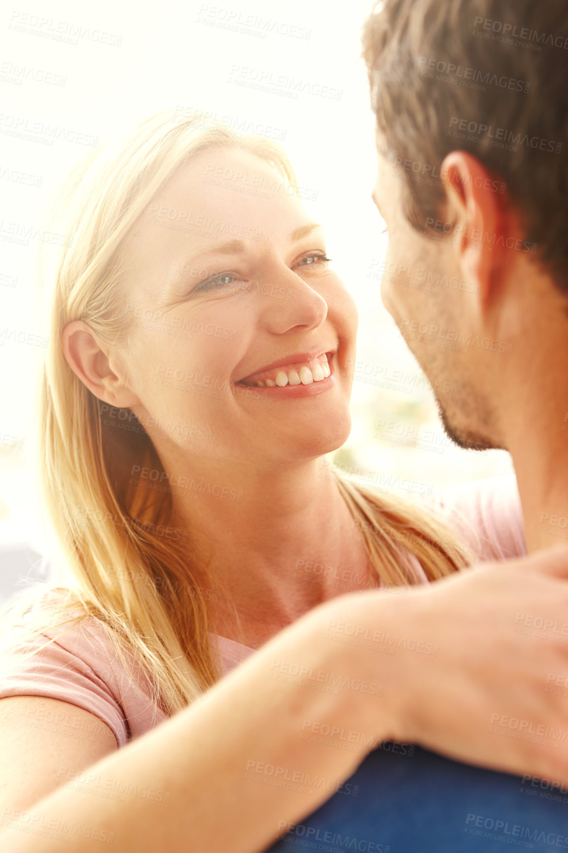 Buy stock photo Couple, hug and smile in nature for love in relationship, romance and weekend date in outdoor. People, embrace and together for affection in marriage, bonding and support or security in connection