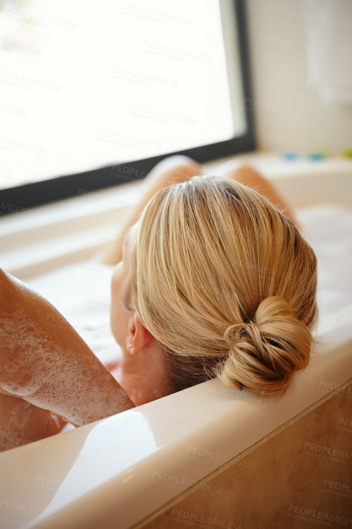 Buy stock photo Bathroom, home and woman in bath relax with soap, bubbles and foam for cleaning, washing and grooming. Morning routine, hygiene and calm person in warm water for skincare, wellness and self care