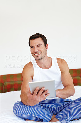Buy stock photo Relax, tablet and man on bed in morning for social media, streaming subscription and internet in bedroom. Happy, home and person on digital tech for website, online news and communication on weekend