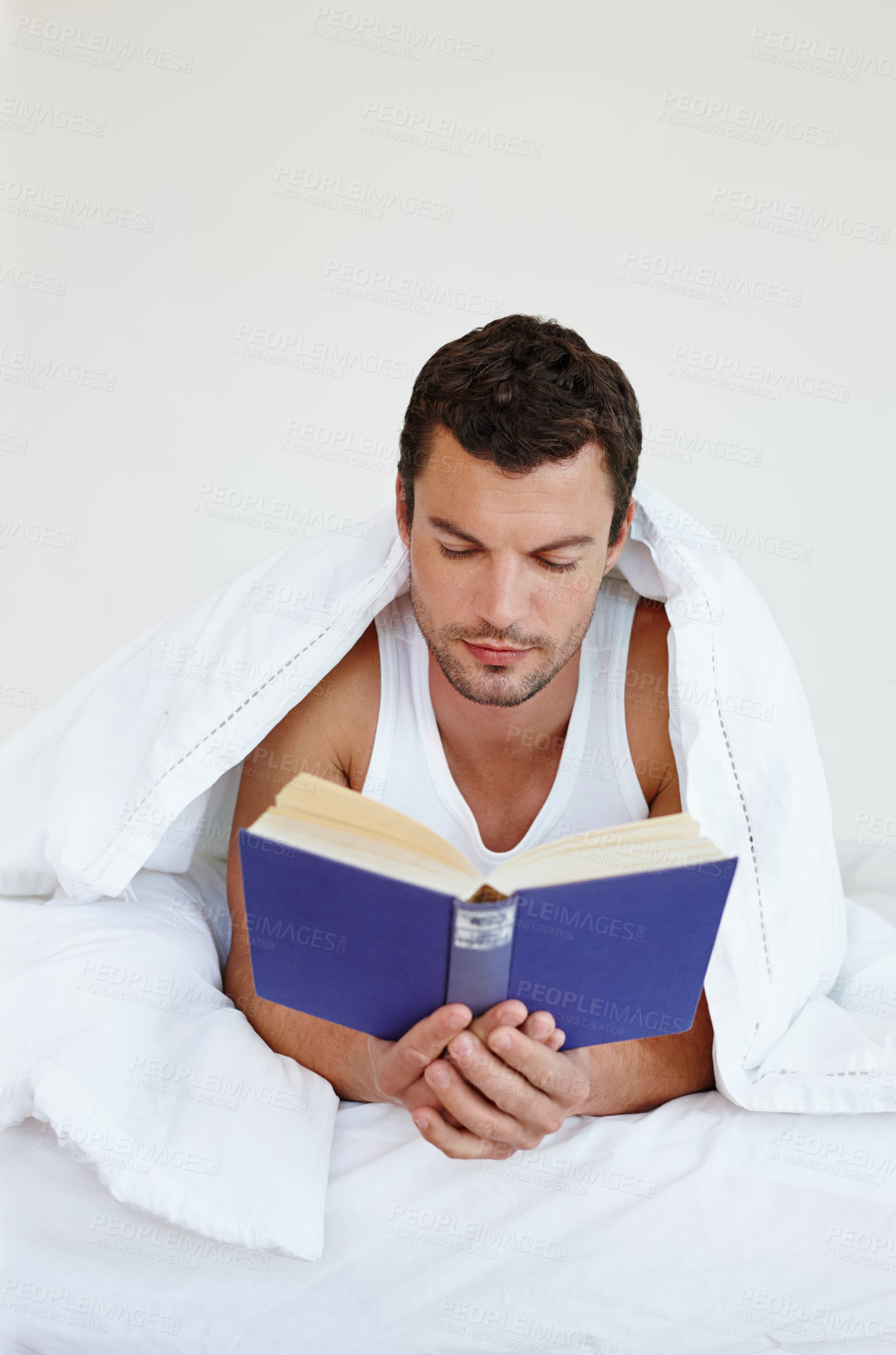 Buy stock photo Man, book and reading in bed with blanket for knowledge, morning and hobby for relax in home. Male person, literature and fiction story for learning or education with wellness, language and poetry