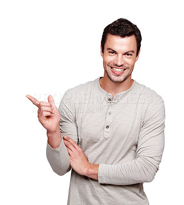 Buy stock photo Pointing finger, space and portrait of a man advertising blank mockup isolated on a white background. Smile of a male model from France with hand sign for promotion, announcement and brand product