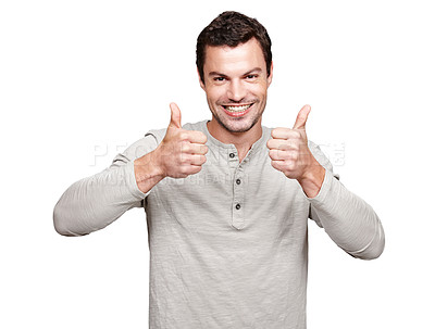 Buy stock photo Portrait, thumbs up and emoji with a man in studio isolated on a white background as a winner or for motivation. Thank you, goal and target with an excited man giving a positive hand sign of support