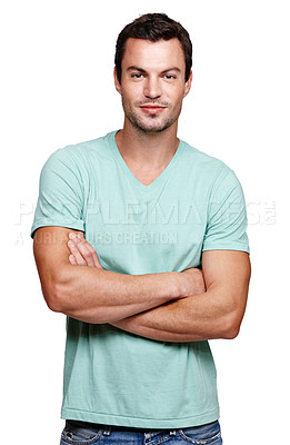 Buy stock photo Portrait, smile and man with arms crossed in studio isolated on a white background looking happy. Pride, cool and modern model male posing in casual clothes for trendy style and positive mindset