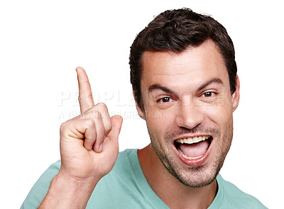 Buy stock photo Portrait, excited and mockup with a man in studio isolated on a white background for marketing or advertising. Face, pointing and mock up with a happy male posing on blank product placement space