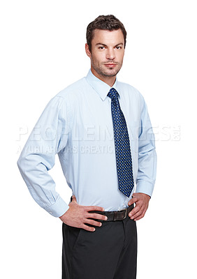 Buy stock photo An experienced businessman standing with his hands on his hips while isolated on white