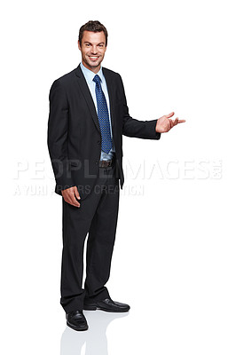Buy stock photo Full length of a young businessman gesturing towards something while isolated on white
