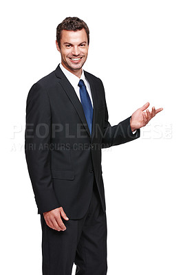 Buy stock photo A young businessman gesturing towards something while isolated on white