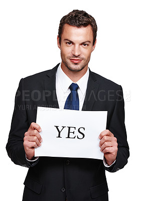Buy stock photo A handsome young businessman holding a placard with 