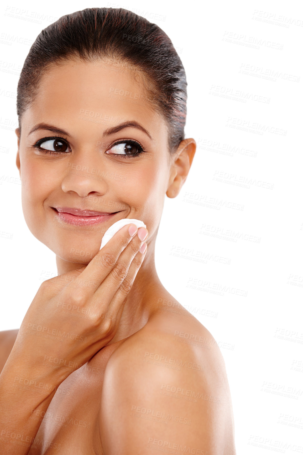 Buy stock photo Cropped view of a young woman using a cotton pad on her skin