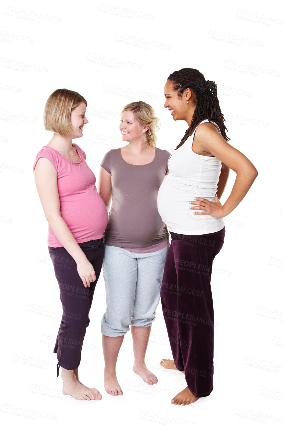 Buy stock photo Happy pregnant friends talking in white background studio with pilates, health or yoga clothes. Mother, maternity and communication with women having a pregnancy lifestyle discussion together 