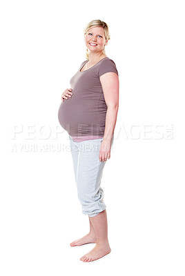 Buy stock photo Pregnant woman, smile and stomach in studio portrait, fashion or excited for baby by white background. Person, happy and ready for motherhood with pride, confidence and maternity clothes for comfort