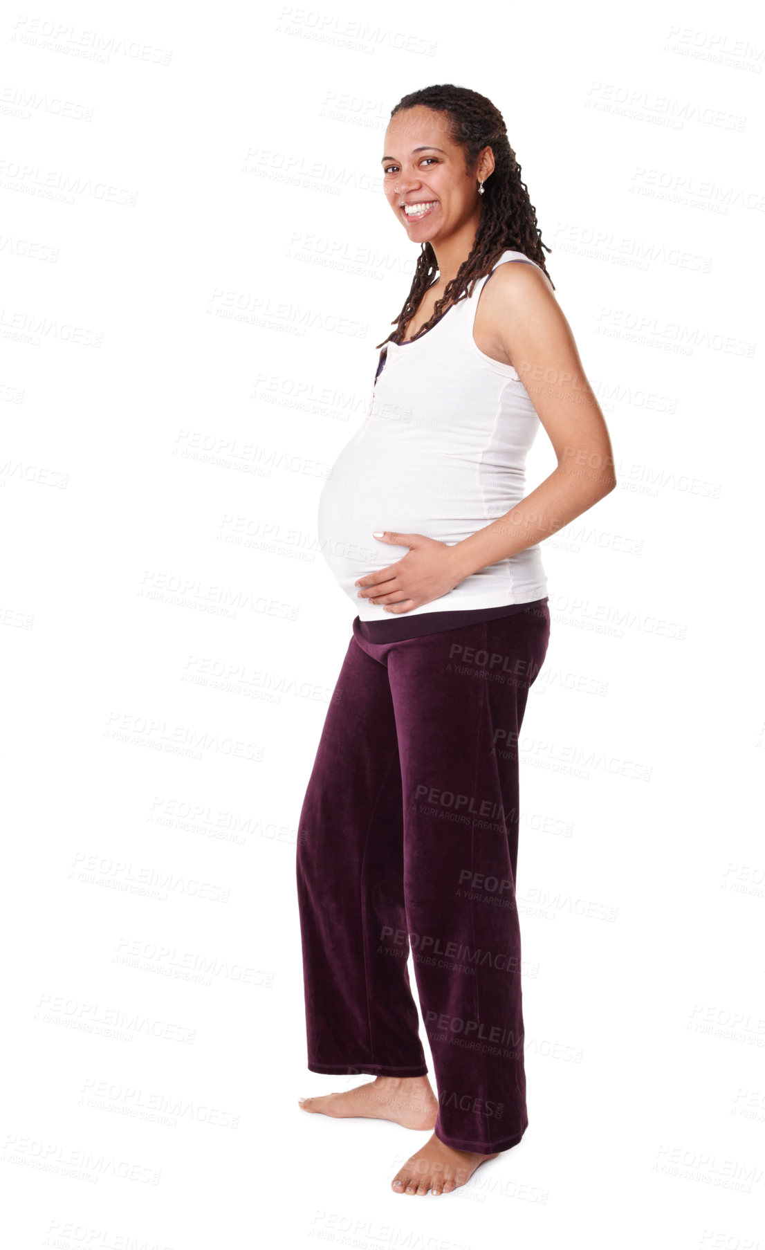 Buy stock photo Portrait of smiling pregnant woman standing barefoot and holding her baby bump. Full length of expecting mother to be isolated against white background in studio with copyspace. Happy woman excited