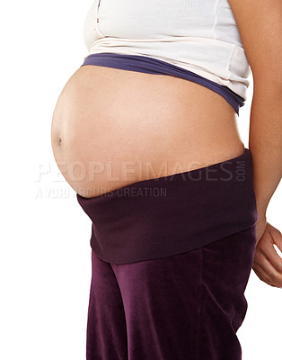 Buy stock photo Pregnant woman, profile and stomach for pregnancy in studio with healthy baby growth, love or closeup. Body, wellness and mother to be with side view of abdomen, tummy or belly on white background