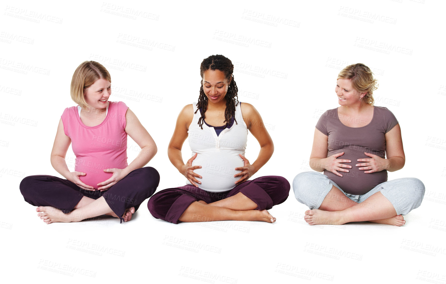 Buy stock photo Pregnant friends sitting together in a row while isolated on white