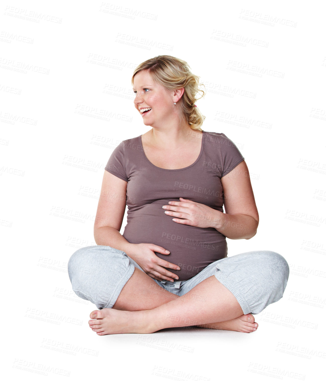 Buy stock photo Happy woman, laughing or pregnancy in studio with healthy baby growth, smile or pregnant person. Development, relax or proud mother to be holding abdomen, tummy or belly isolated on white background