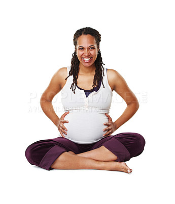 Buy stock photo Portrait of a pregnant mother or woman in happy sitting and holding her baby bump isolated on a white background. Black female excited, smile and ready for a newborn child alone with cross legs.