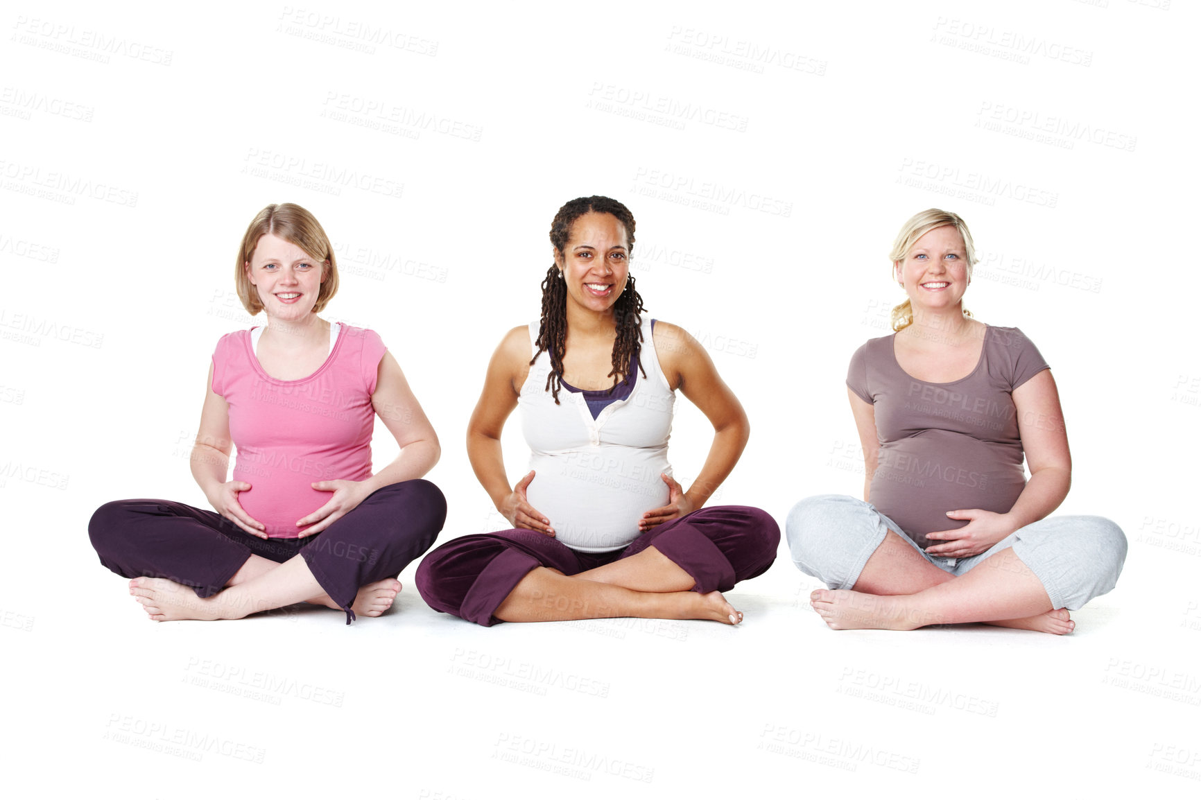 Buy stock photo Pregnant woman, group and portrait on floor for yoga, smile or solidarity in studio by white background. People, mother or wellness club for pregnancy with diversity, happy or connection with support