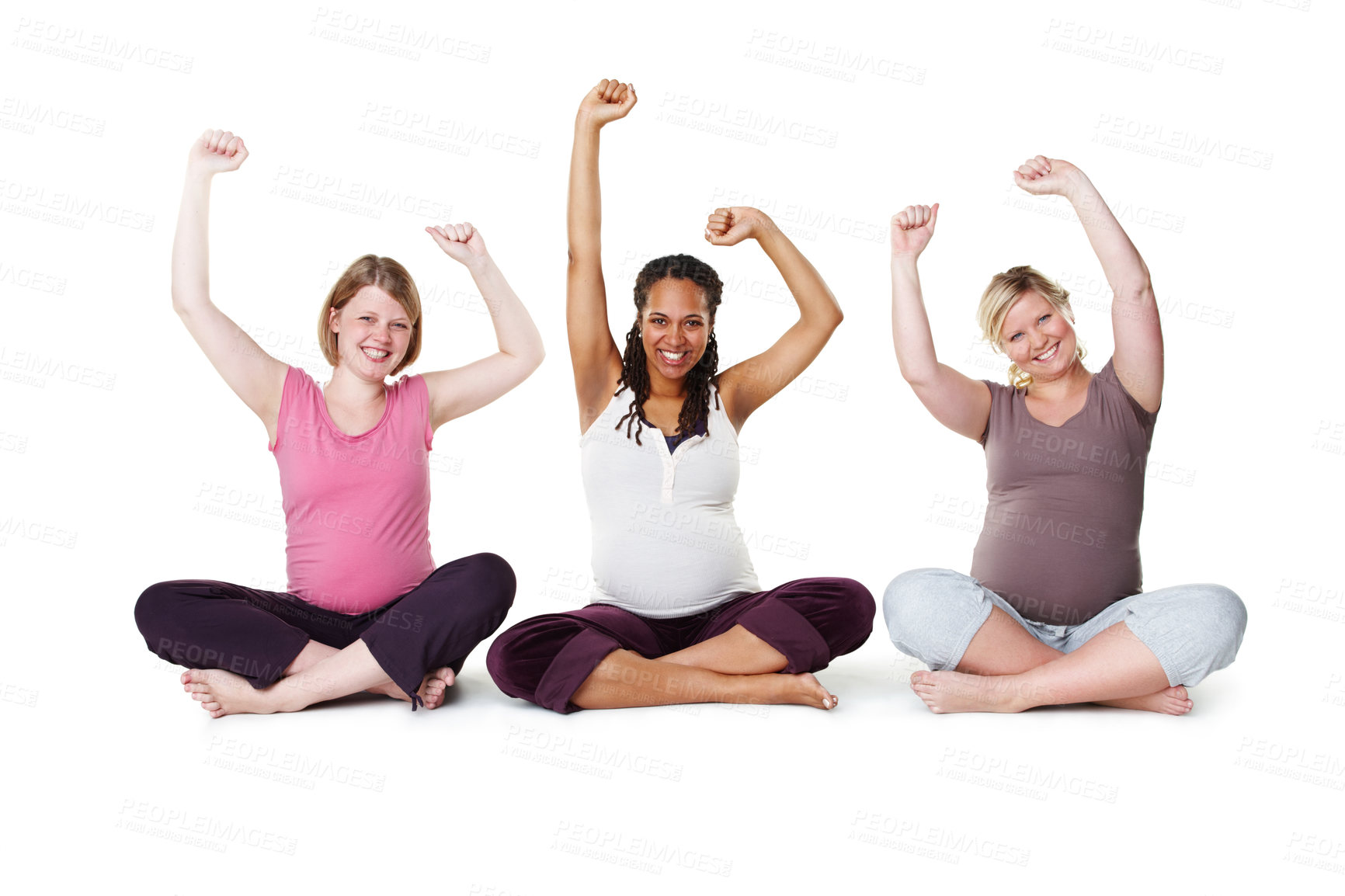 Buy stock photo Pregnant, happy, and healthy, women sitting on the floor, arms raised in celebration of new life. Mothers, friends, and happiness during pregnancy, a group of future moms workout on white background