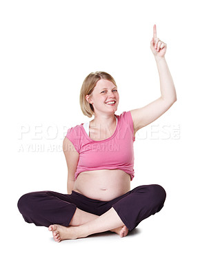 Buy stock photo Hand up, portrait and pregnant woman in studio with smile, healthy baby growth and safe pregnancy. Development advice, answer or happy mother pointing with abdomen, tummy or belly on white background