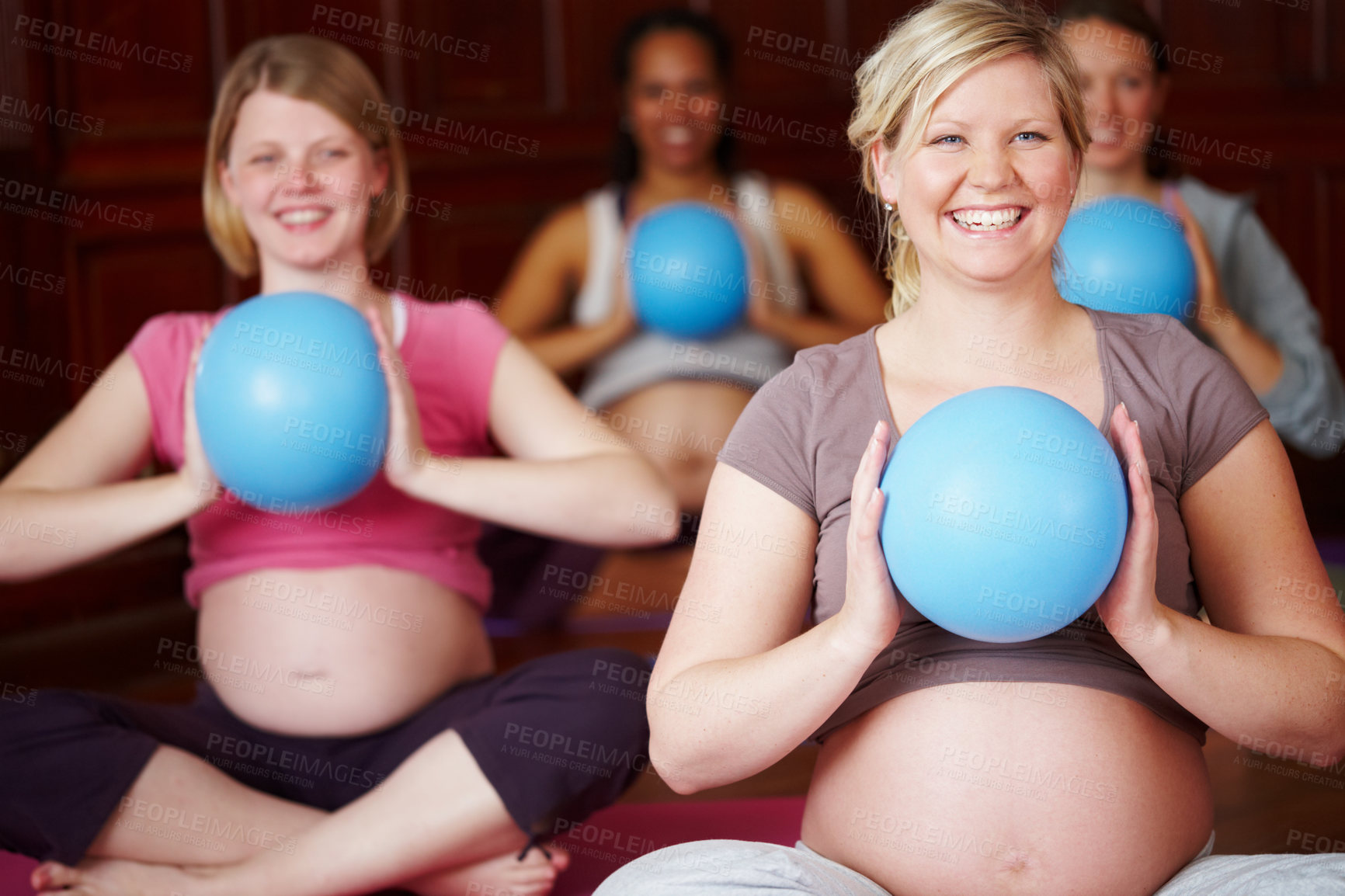 Buy stock photo Women, pregnant and yoga class for breathing, health and wellness with stomach, portrait and smile. Mother, abdomen and happiness in studio for fitness, motherhood and body awareness or prenatal care