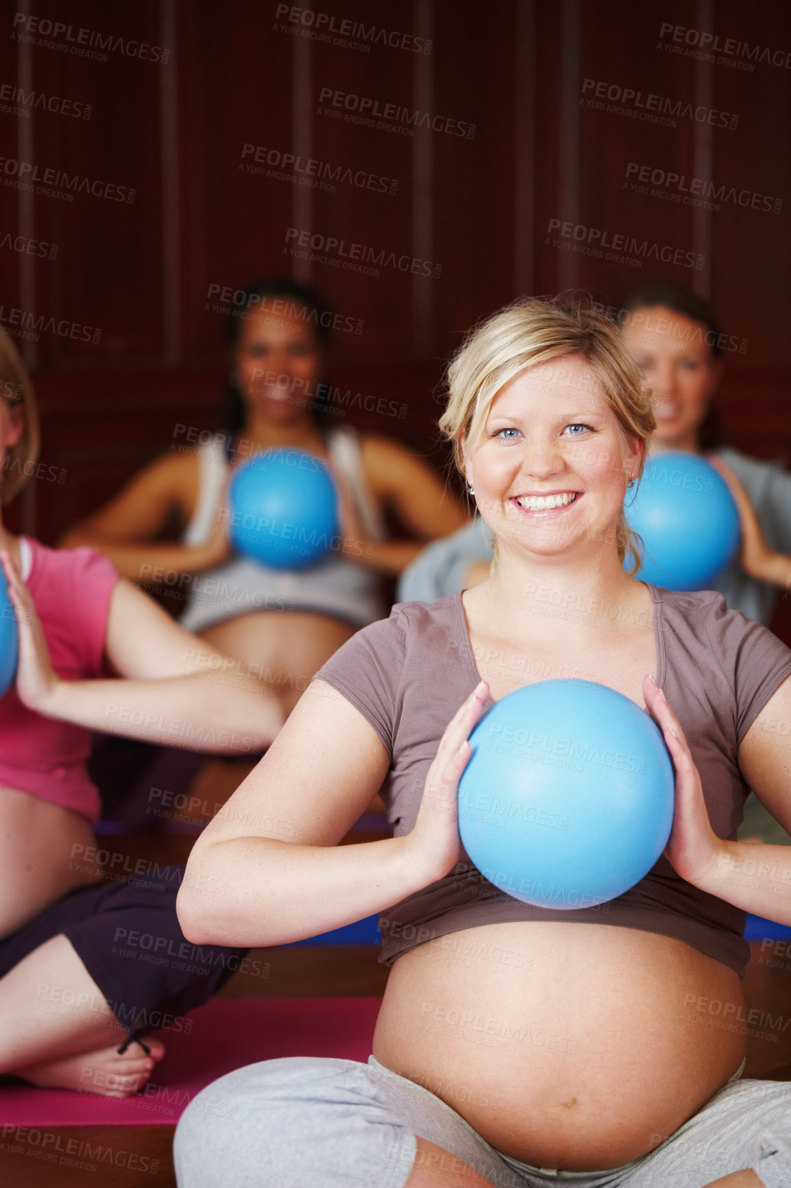 Buy stock photo Woman, pregnant and yoga class for health, wellness and breathing with stomach, portrait and smile. Motherhood, face and happiness in studio for fitness, maternity and body awareness or prenatal care