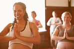 Enjoying a pregnancy yoga class